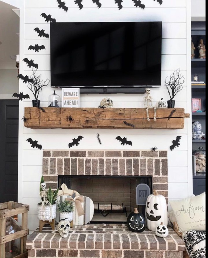 Halloween decor trends flying paper bats Halloween mantle inspo
