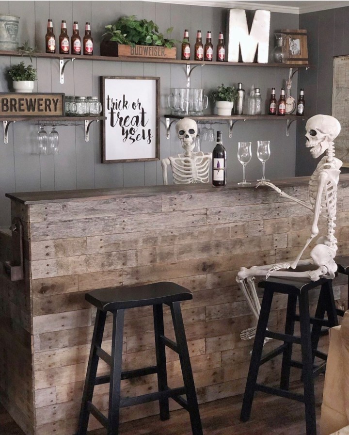 Halloween decor trends flying paper bats Halloween mantle Skeletons